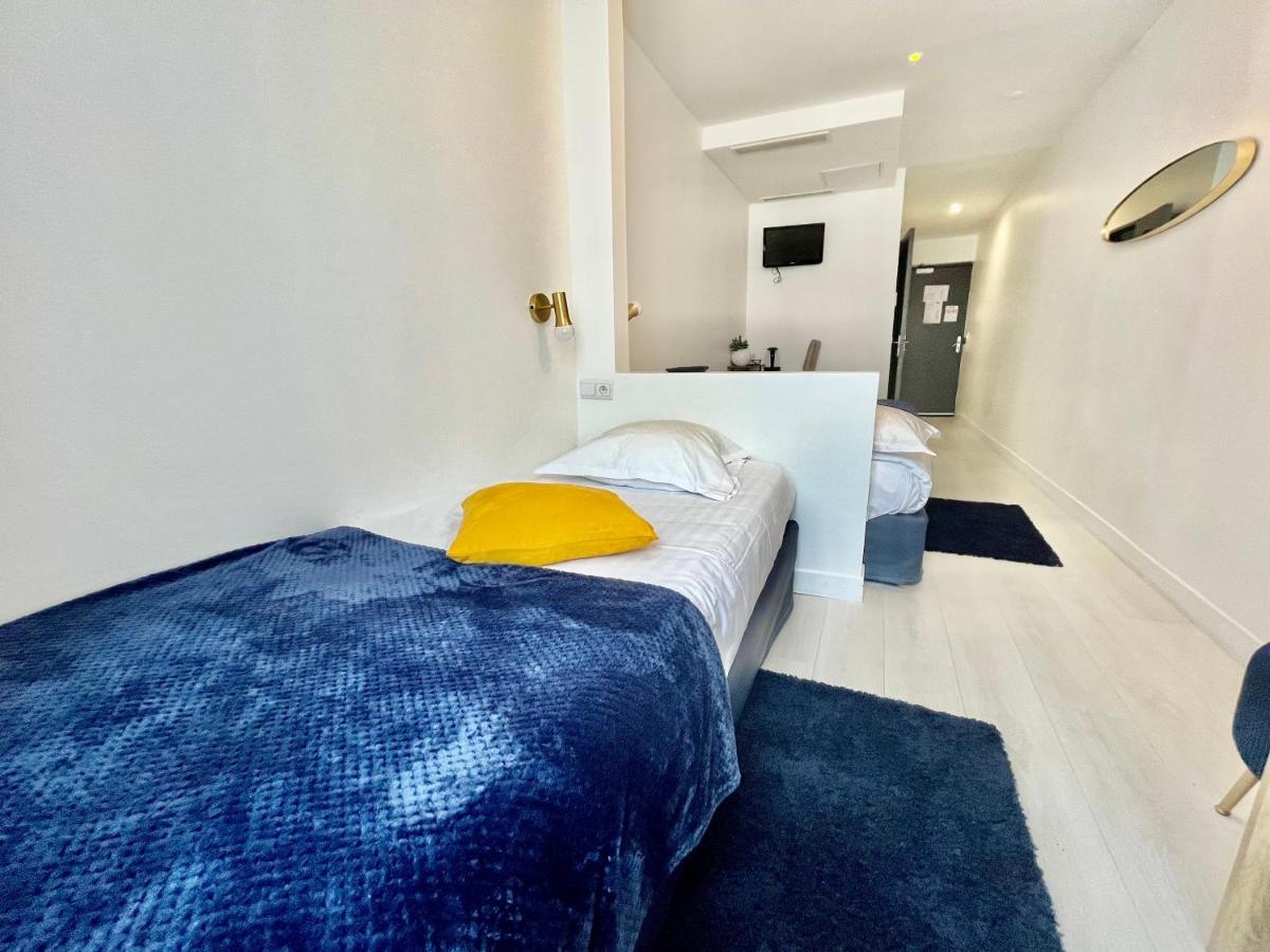 Hotel L'Oasis Montparnasse París Exterior foto