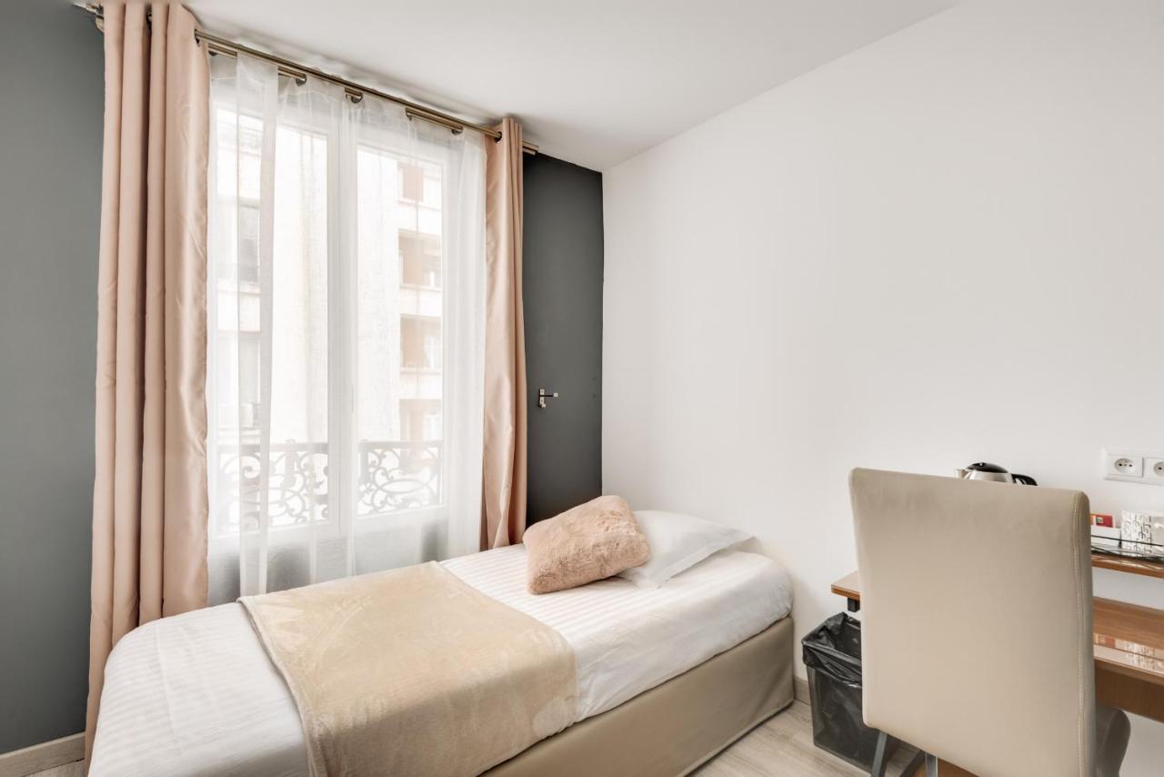Hotel L'Oasis Montparnasse París Exterior foto