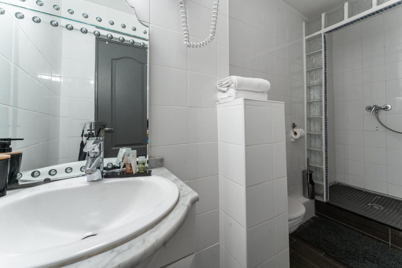 Hotel L'Oasis Montparnasse París Exterior foto